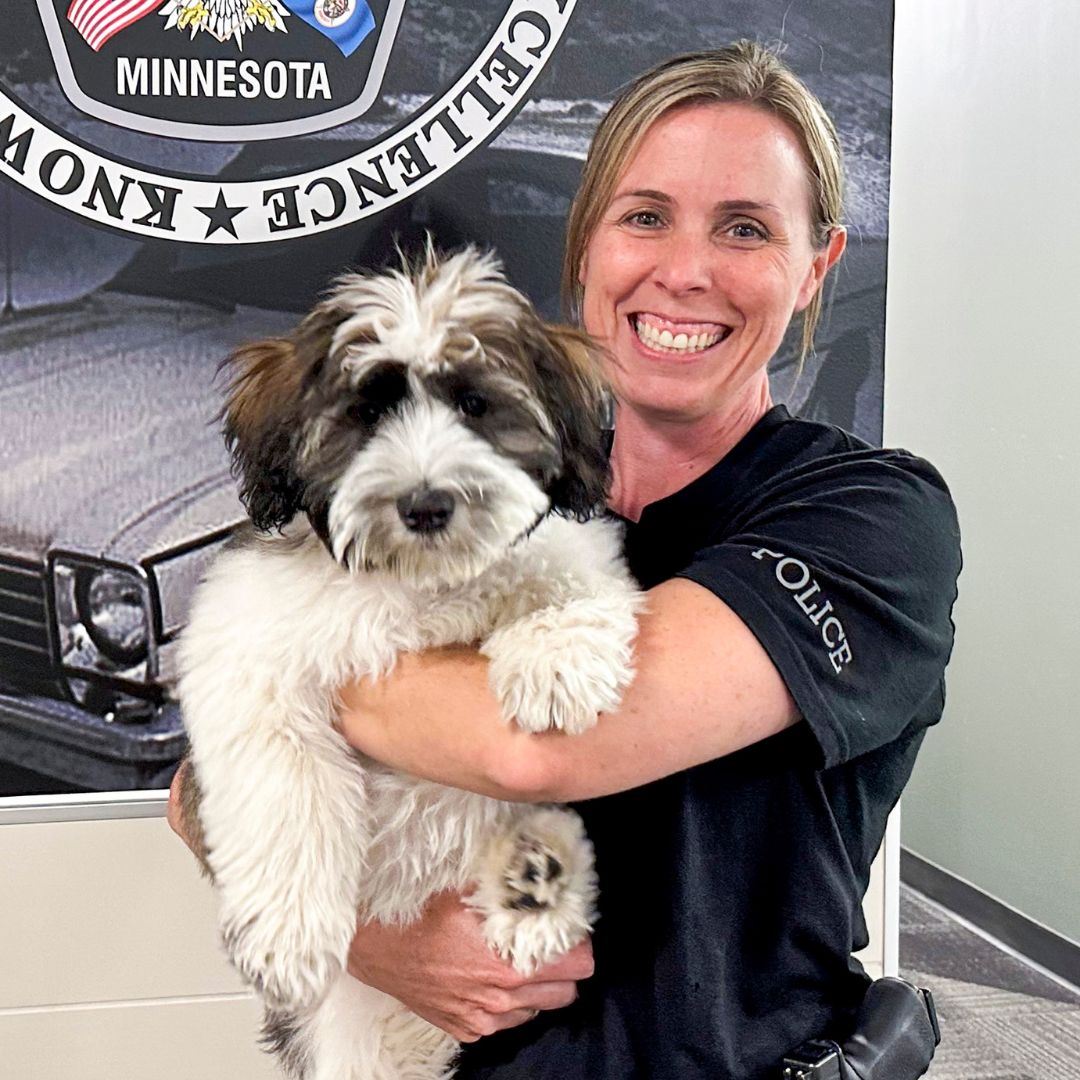 Detective Andrea Newton and wellness dog Doc