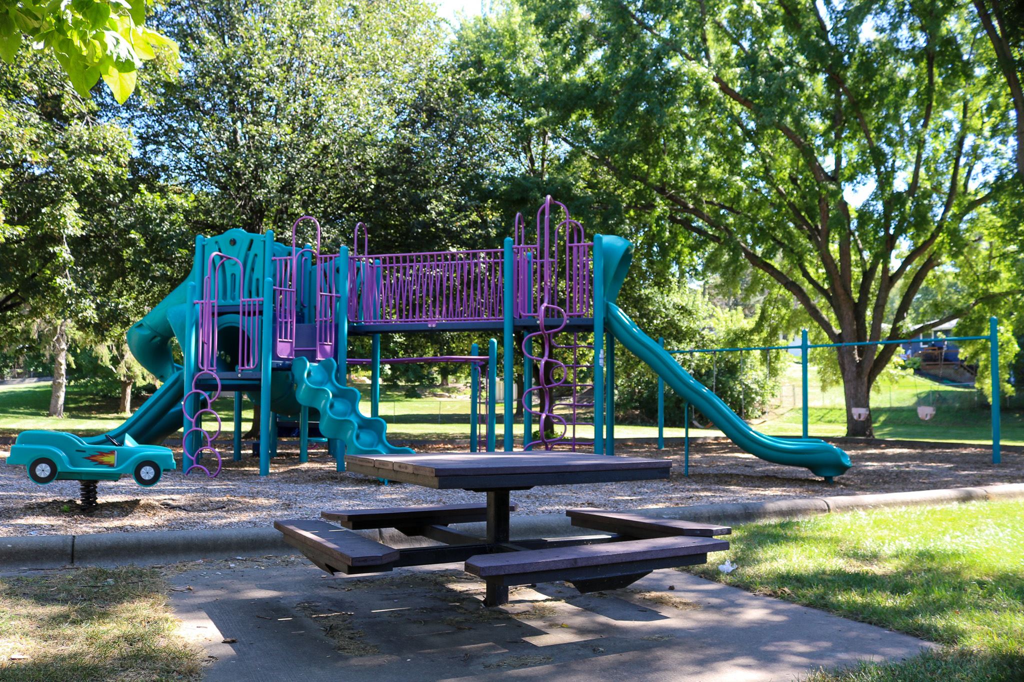 Acorn Park playground shaded by trees