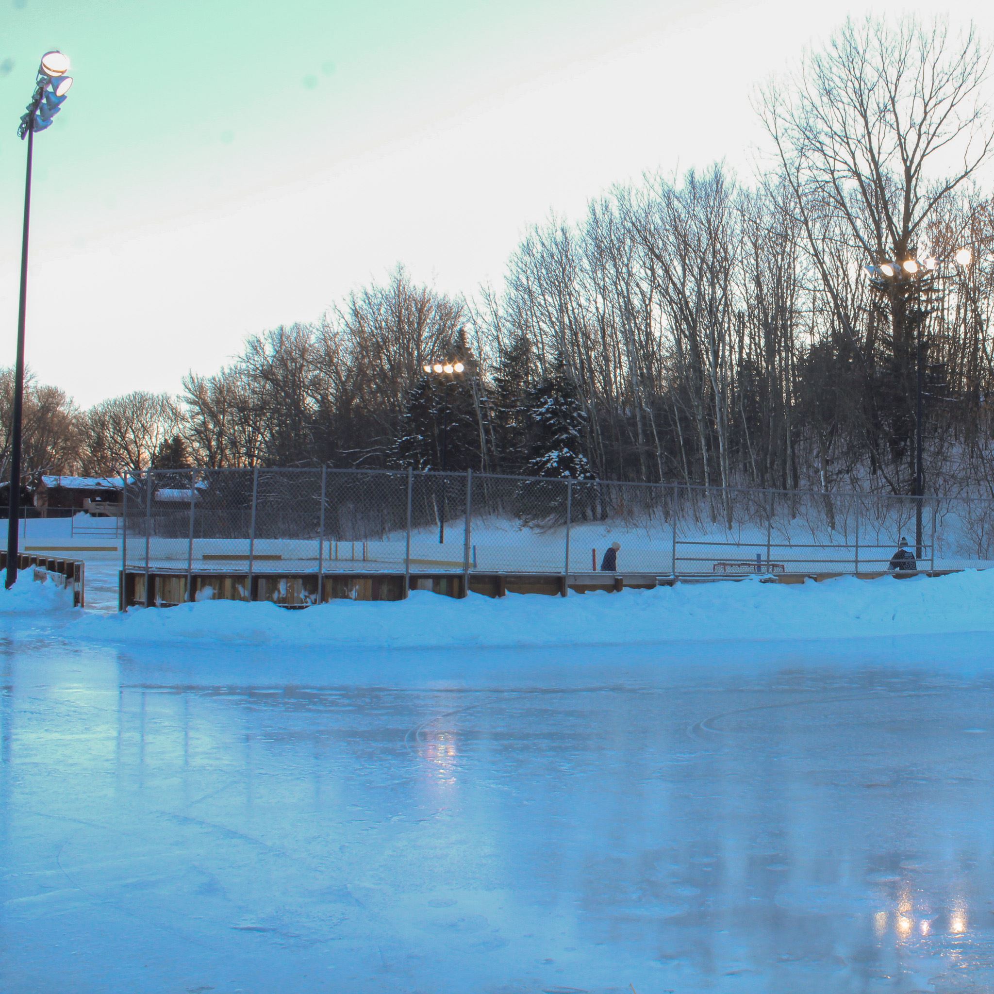 Outdoor skating rink at sunset